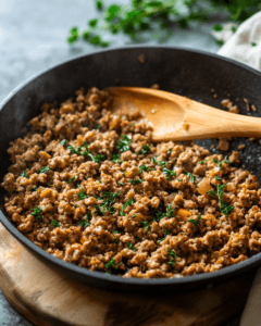 Foil-covered lasagna going into the oven